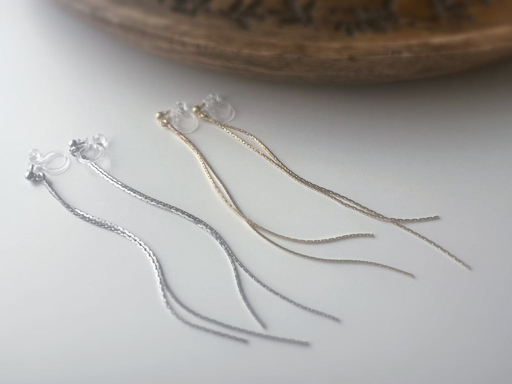 Longues Lignes Fluides – couleur Or / Argent
