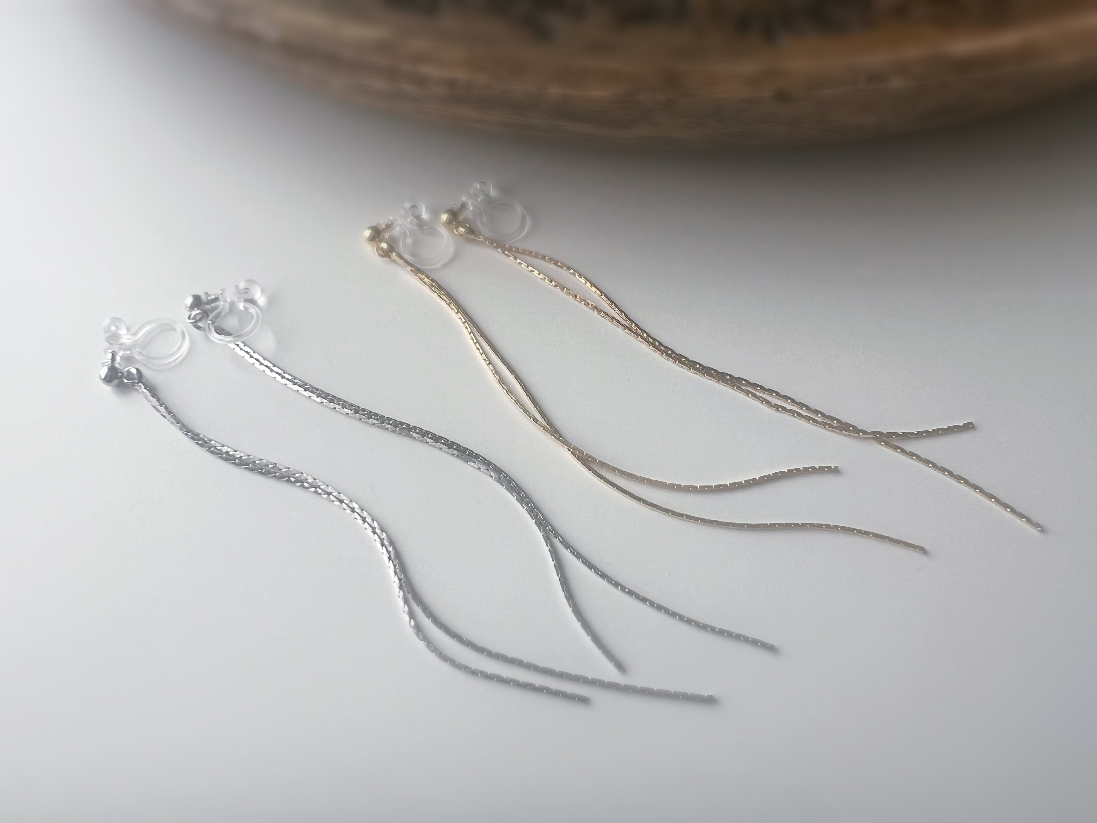 Longues Lignes Fluides – couleur Or / Argent