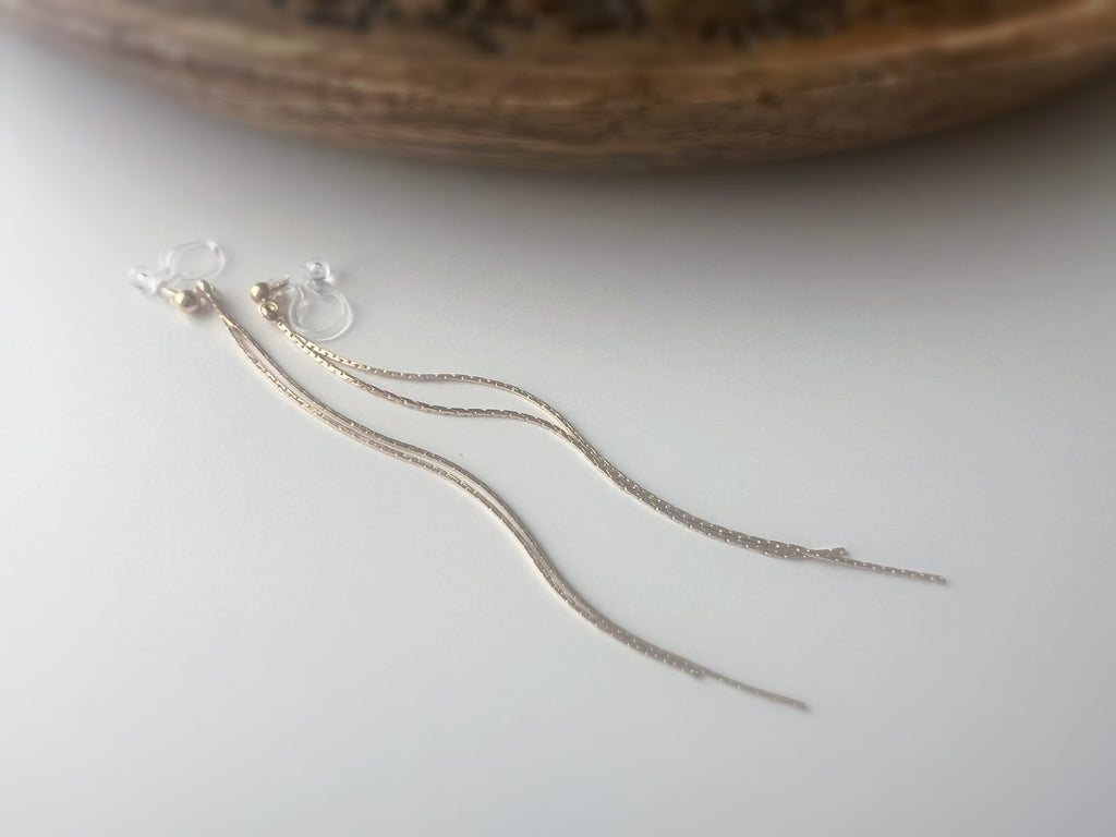 Longues Lignes Fluides – couleur Or / Argent