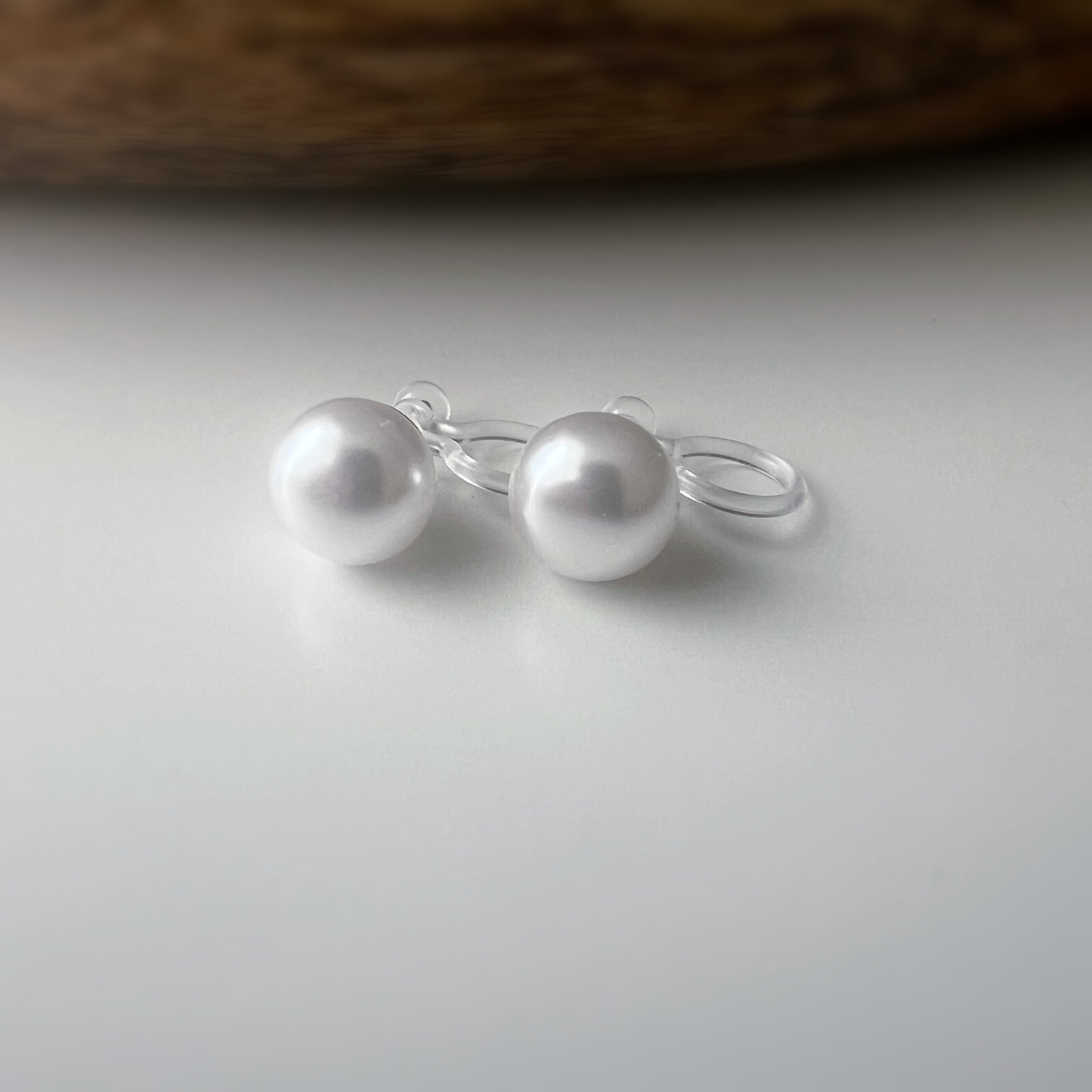 Clips d’oreilles Invisibles perle blanche