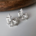 CLIPS d’oreilles nœud cristal argent