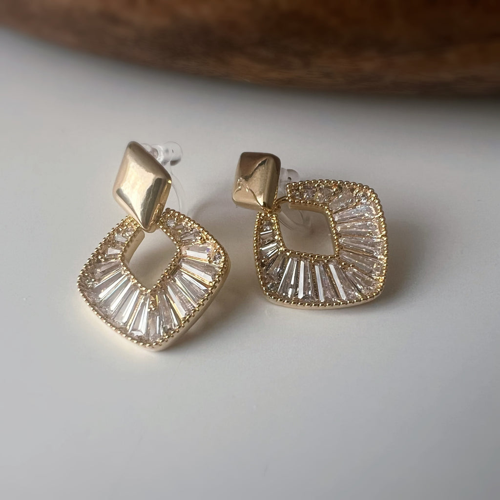 Clips d’oreilles géométriques scintillants