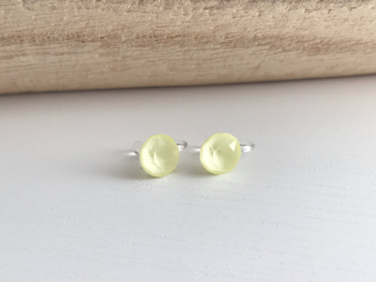 Minimalist invisible ear clips. PureCristal Crystals, Small Round Color Cream pink/ Cream green/ Cream blue/ Cream yellow. Crystal