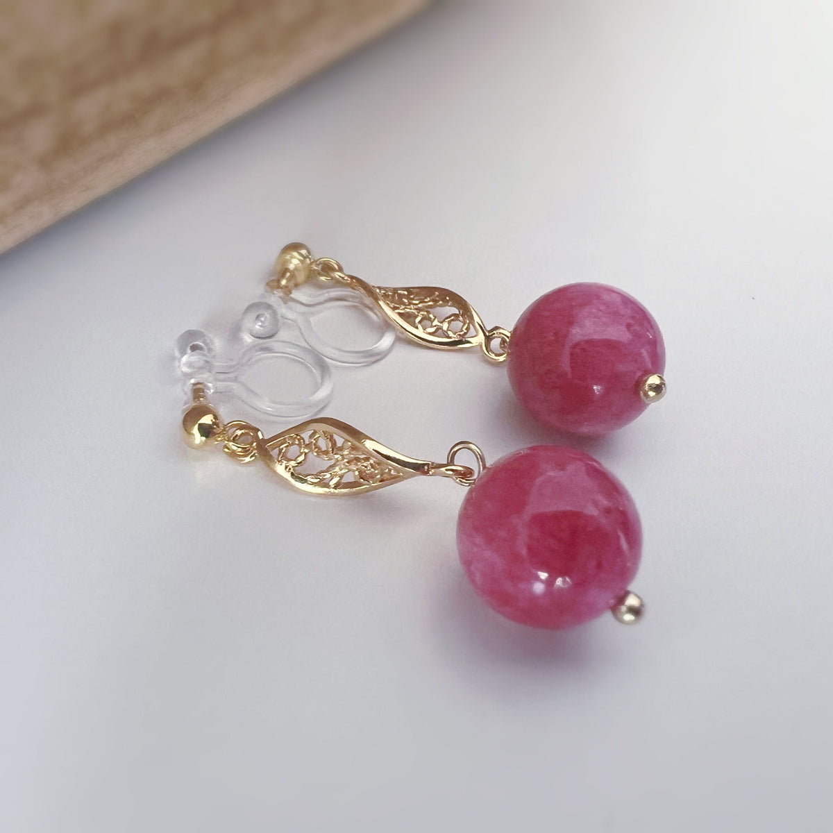 INVISIBLE Clip-on earrings, Gold ear clips Hollow almond-shaped sculpture Dark pink chalcedony bead Daily Ready to offer