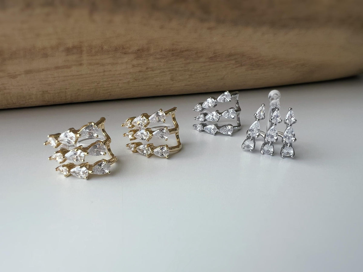Boucles d'oreilles clips élégantes en zircon en forme de gouttes Or / Argent. Un design raffiné pour une touche de glamour et d'éclat.