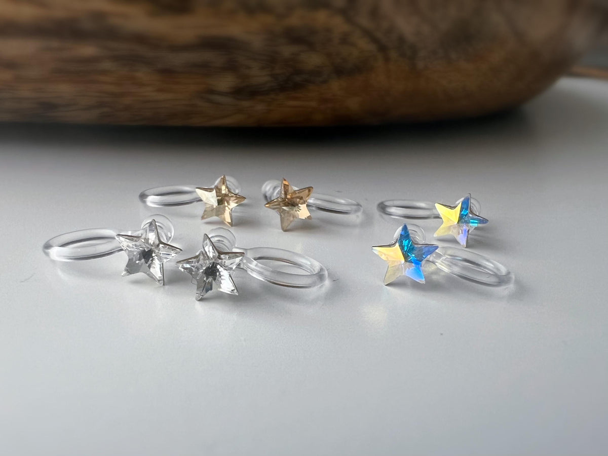 Mini étoile Cristaux PureCrystal Boucles d’oreilles clip légères et confortables, idéales pour illuminer vos tenues sans perçage.